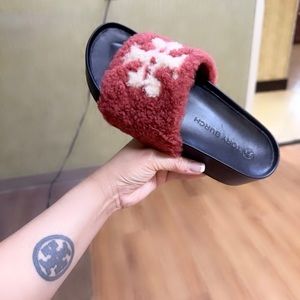 TORY BURCH T Shearling slide platform sz 6